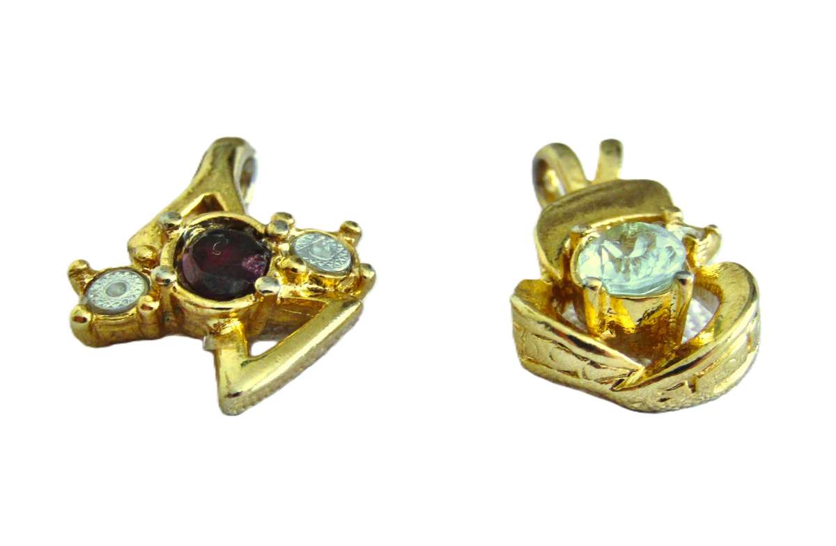 Pair of vintage gold tone 1970s style pendants with faceted crystal