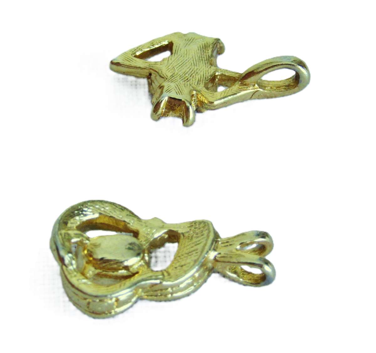 Pair of vintage gold tone 1970s style pendants with faceted crystal