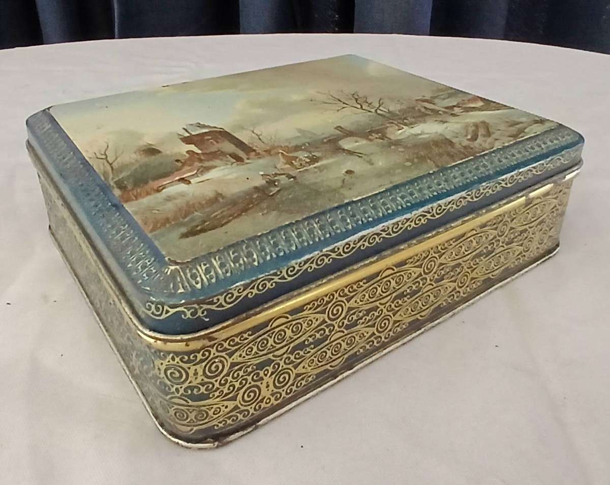 Vintage L'Exquisite Chocolates Tin | Dutch Master Skating Scene Lid
