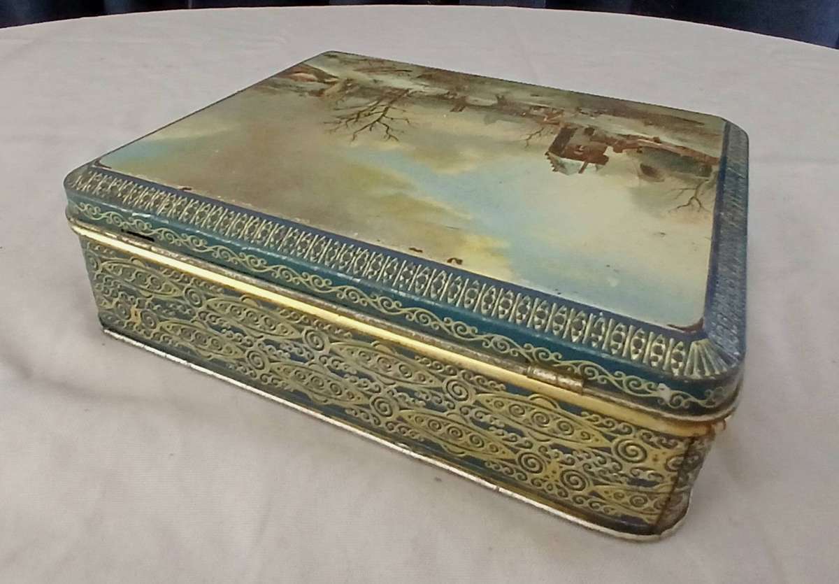 Vintage L'Exquisite Chocolates Tin | Dutch Master Skating Scene Lid