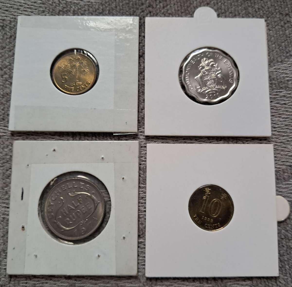4 X UNC WORLD COINS