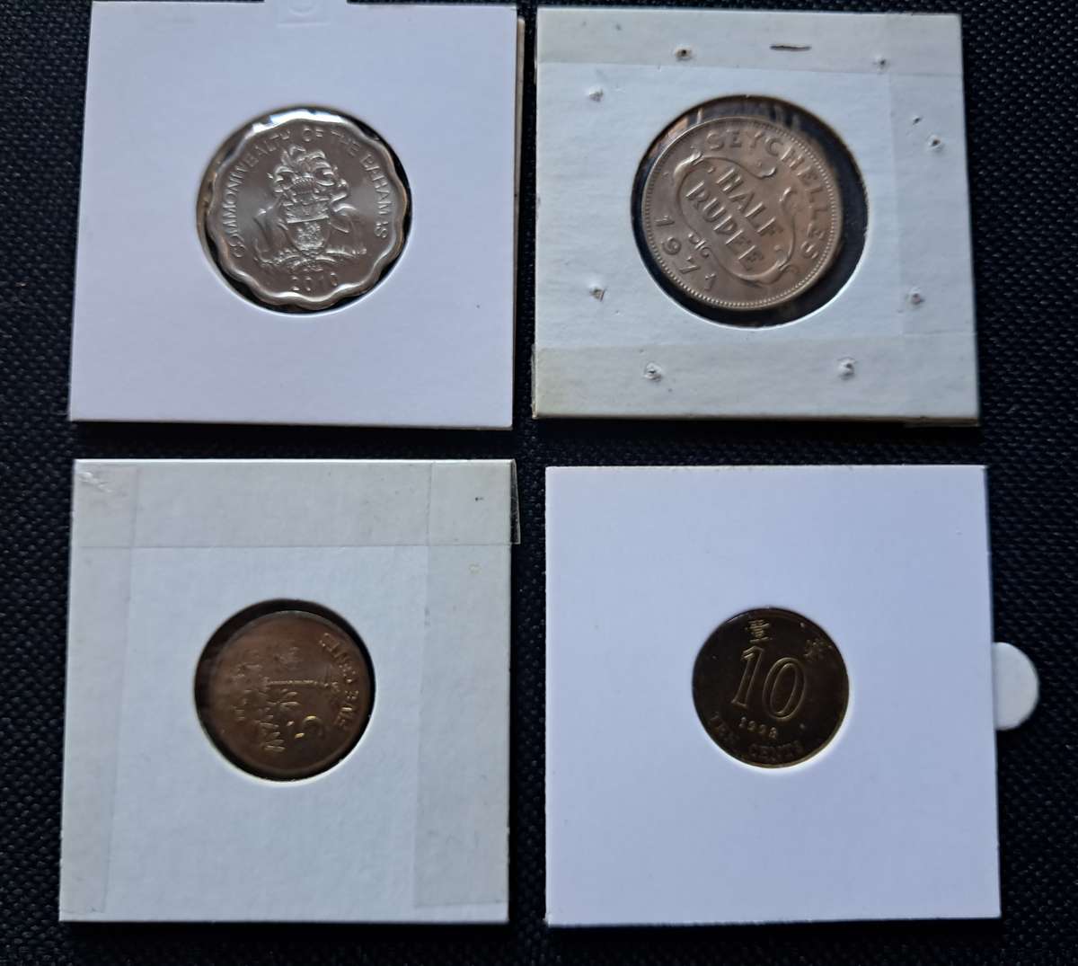 4 X UNC WORLD COINS