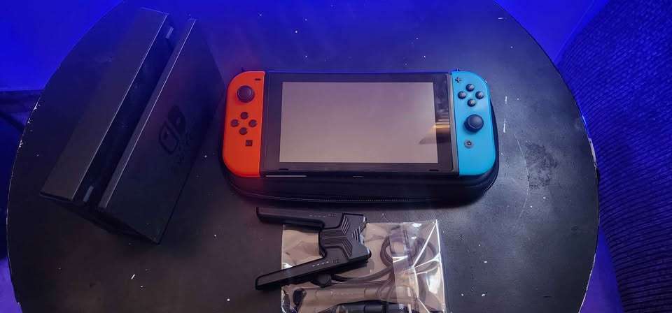 Nintendo switch console - with accessories - neon blue/neon red