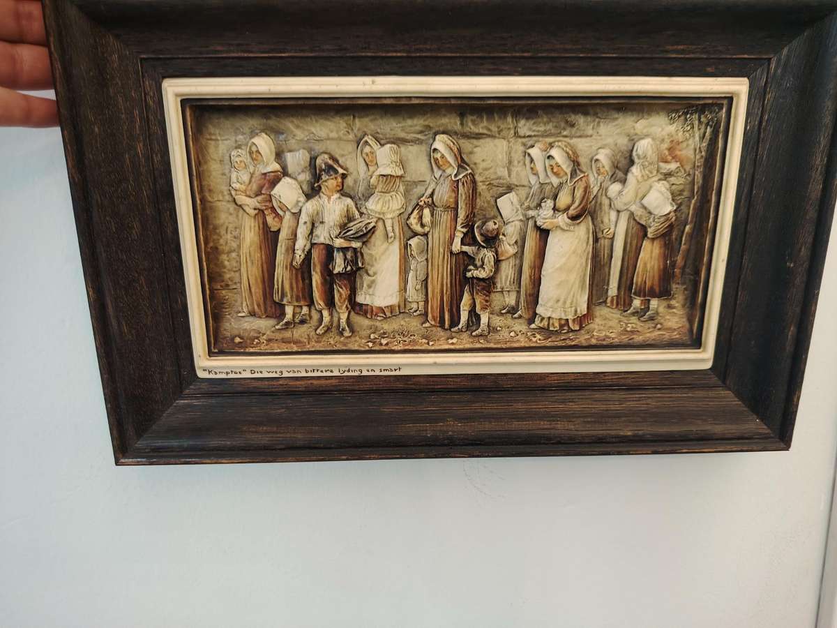 Carved Voortrekker remembrance wall hangings