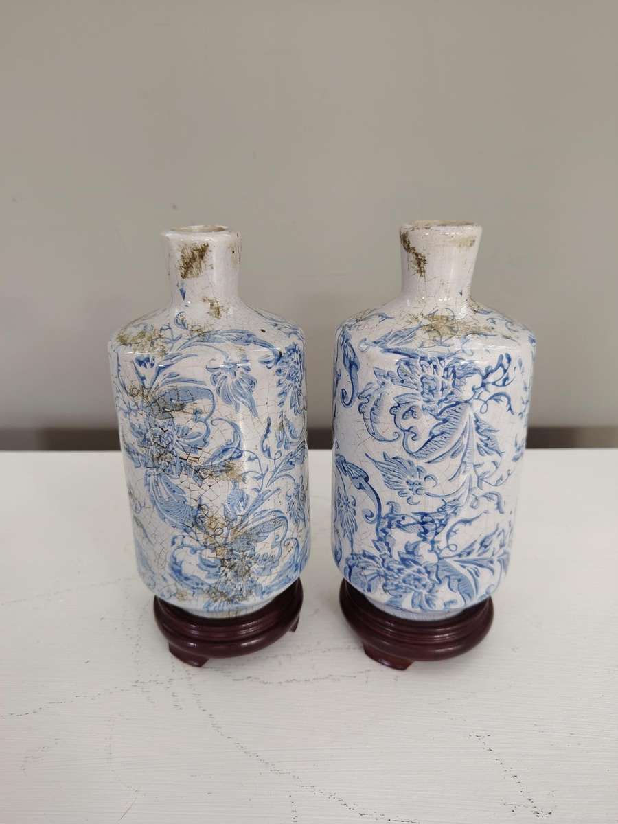 Vintage set Blue and white bottles in plinths