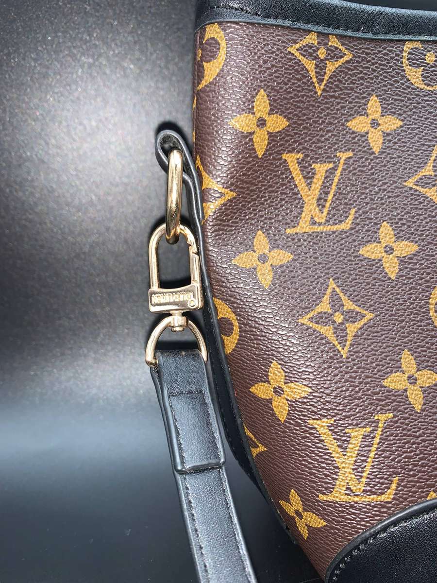 Designer Handbag in Monogram Canvas with black leather trim