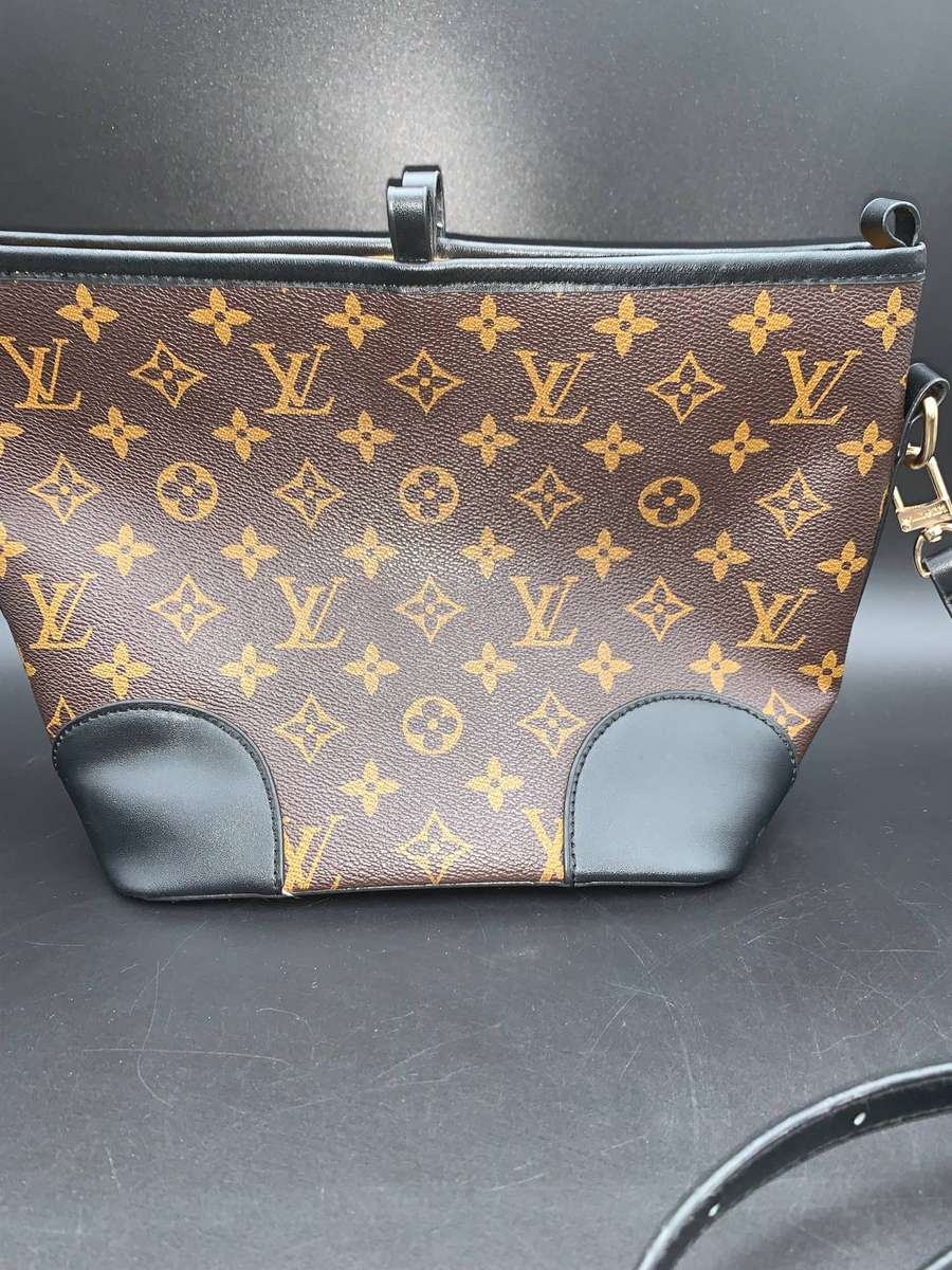 Designer Handbag in Monogram Canvas with black leather trim