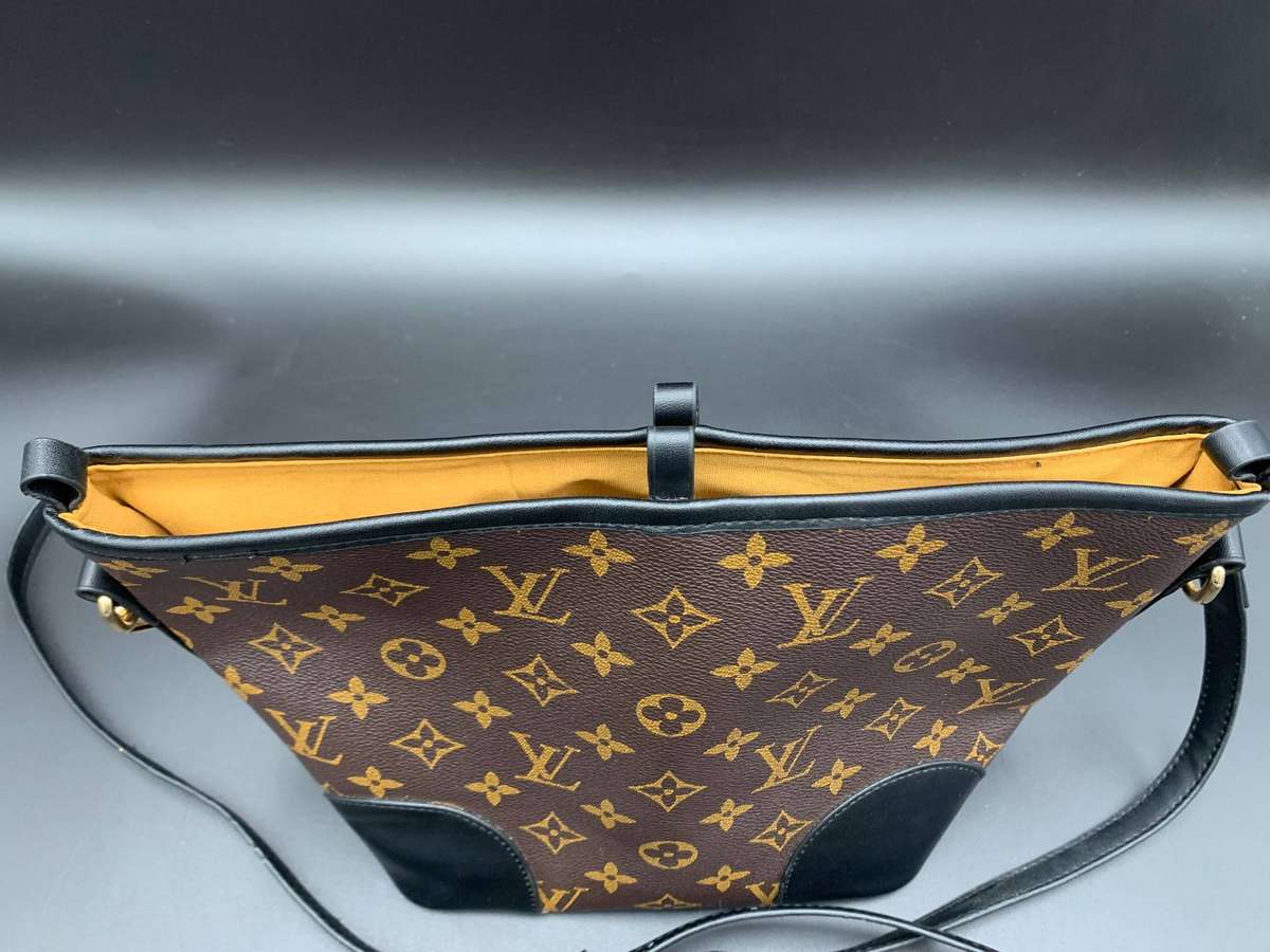 Designer Handbag in Monogram Canvas with black leather trim