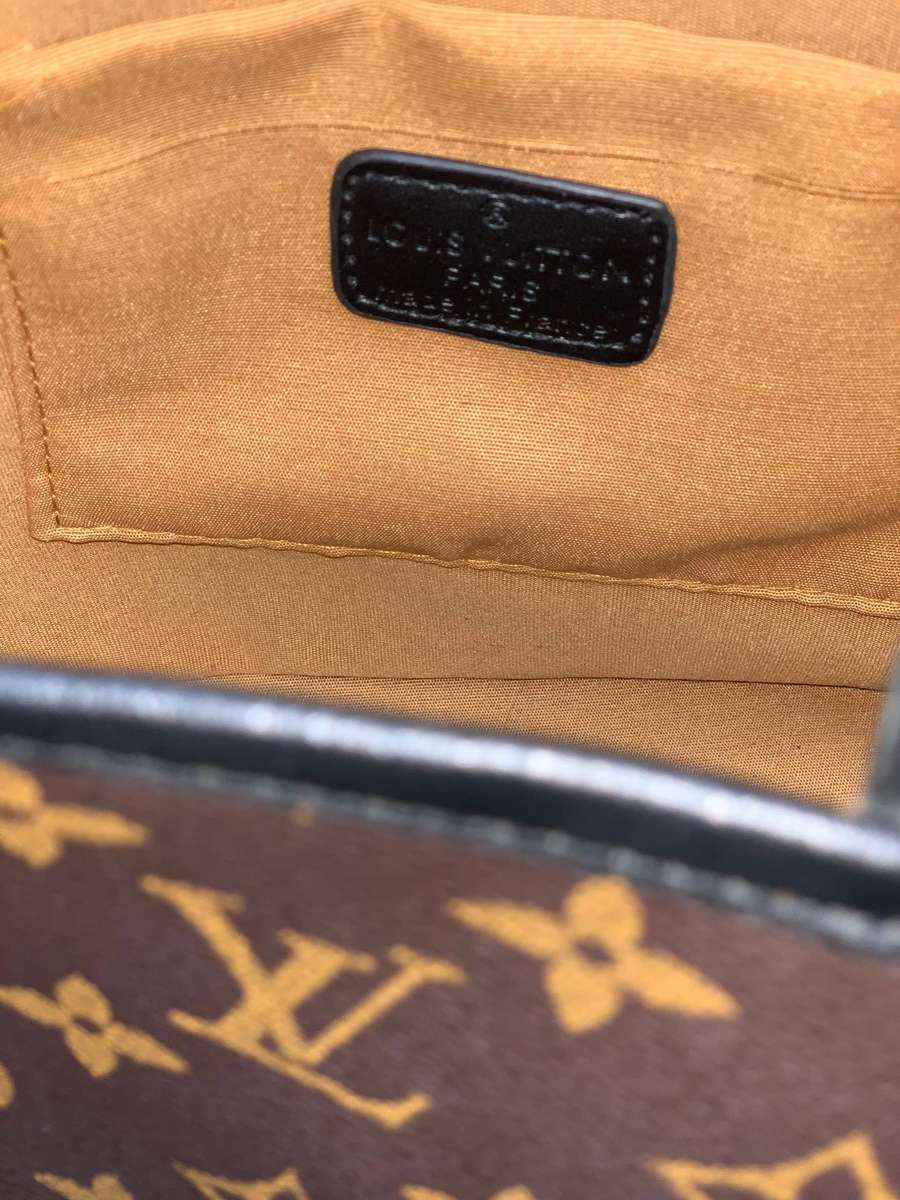 Designer Handbag in Monogram Canvas with black leather trim
