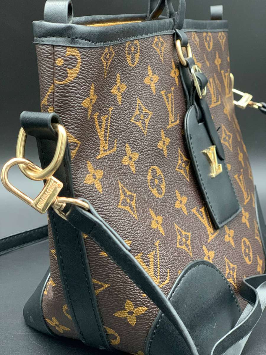 Designer Handbag in Monogram Canvas with black leather trim