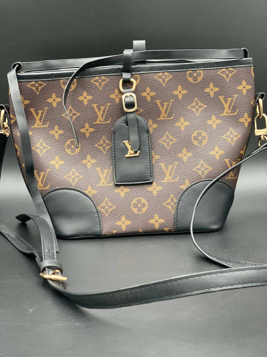 Designer Handbag in Monogram Canvas with black leather trim