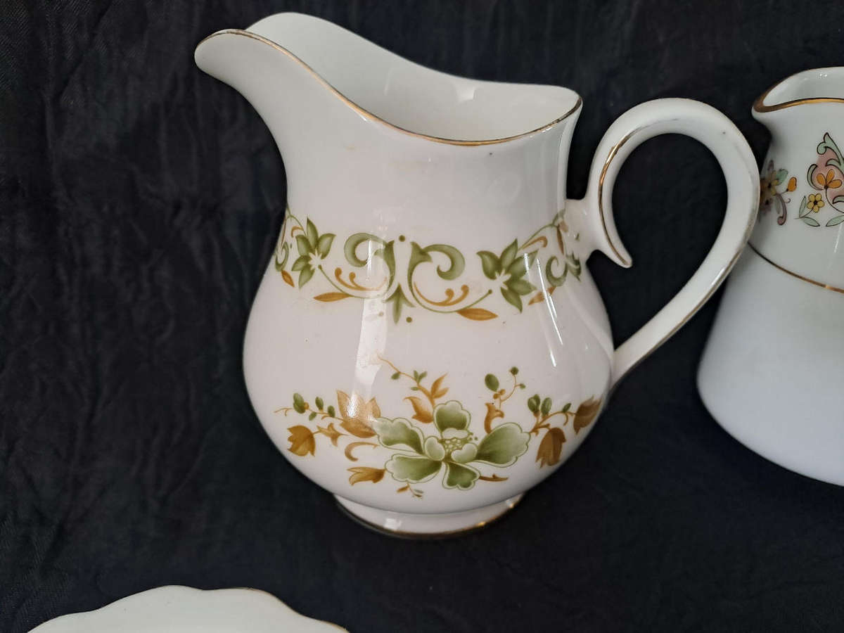 Royal Albert and Noritake milk jugs, 3 Roslyn China Great Brittain nut dishes