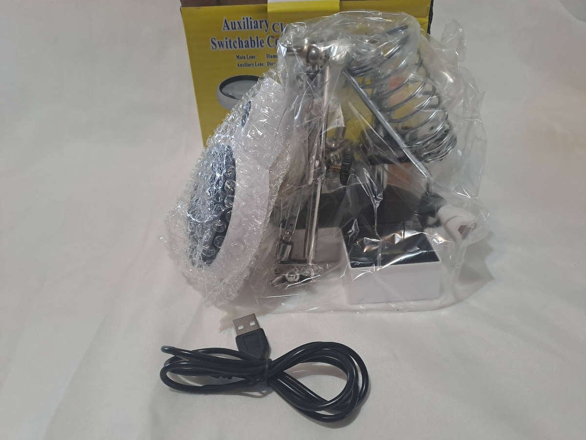 Auxiliary clamp magnifier