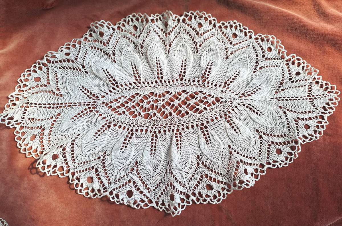 Delicate oval knitted doily - white - 28 x 46cm