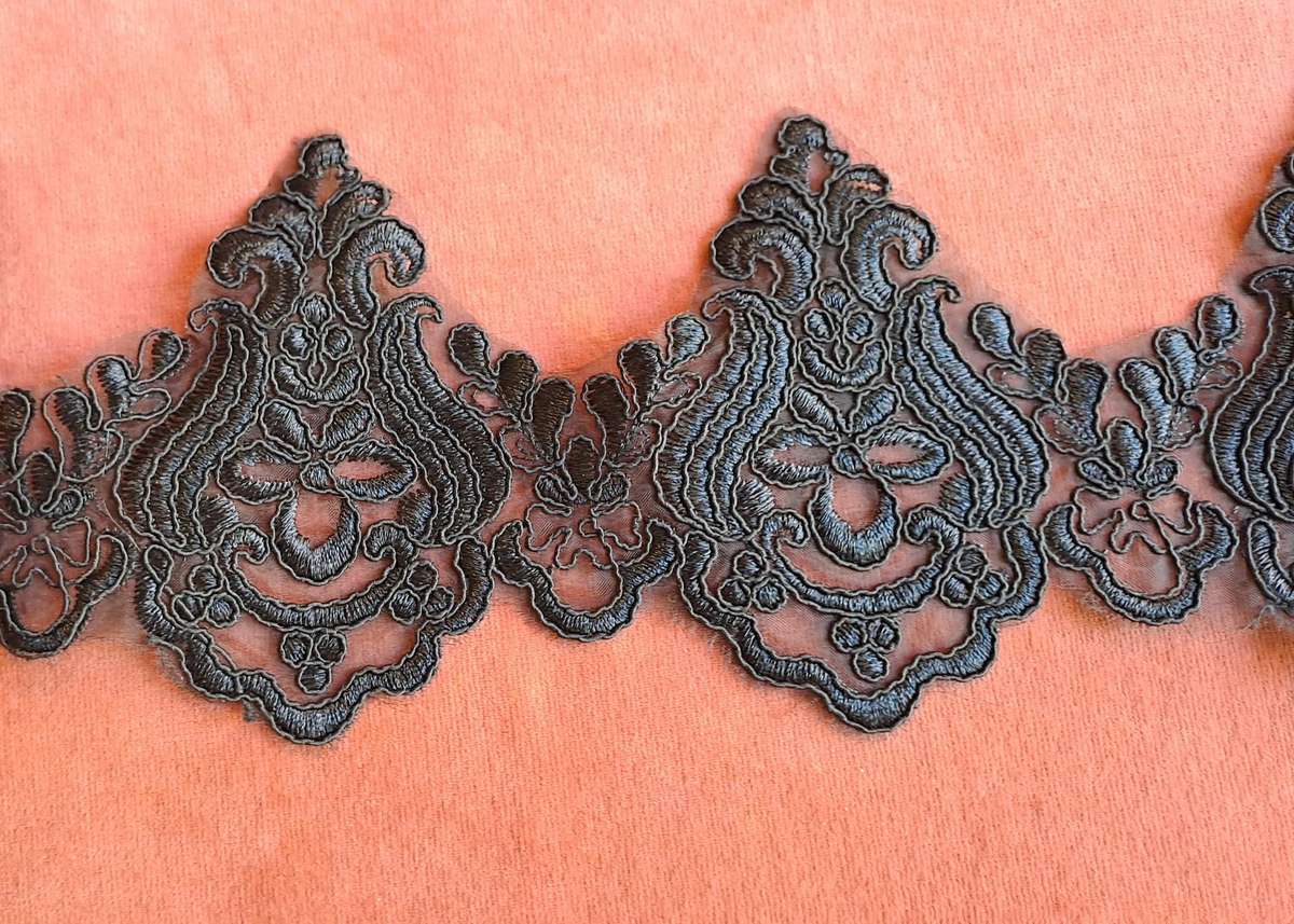 Piece of wide black lace trim  -  130 x 13 cm