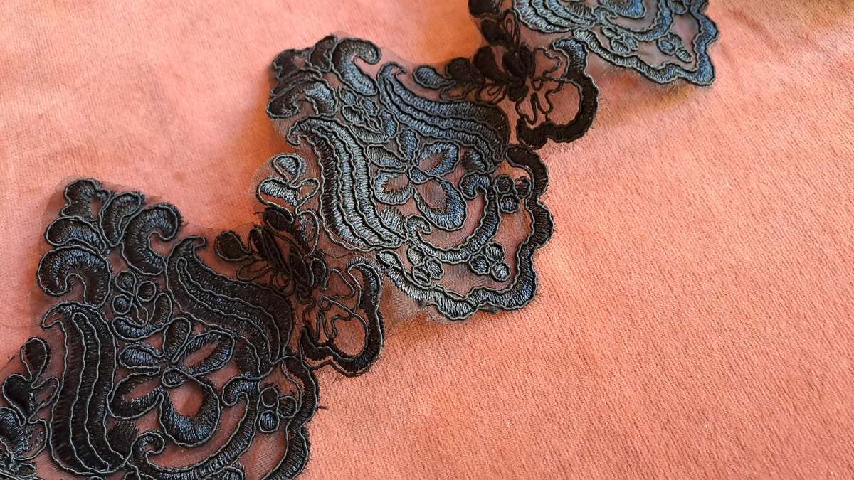 Piece of wide black lace trim  -  130 x 13 cm