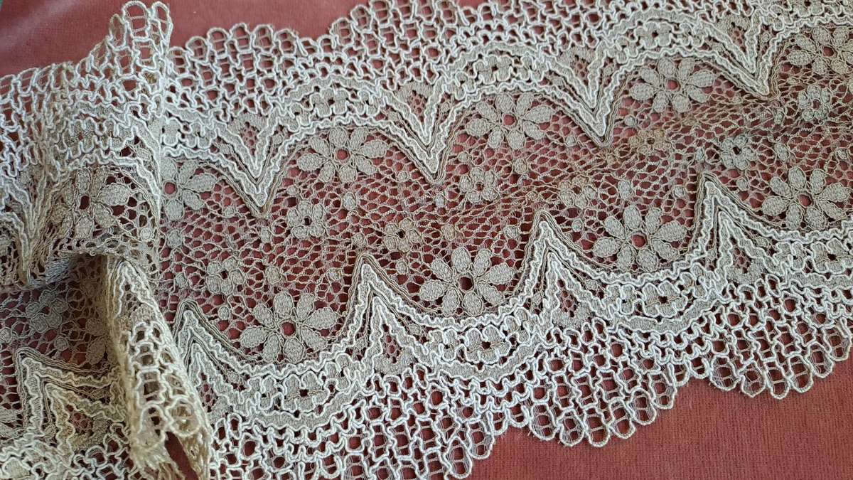 Piece of wide black lace trim  -  130 x 13 cm