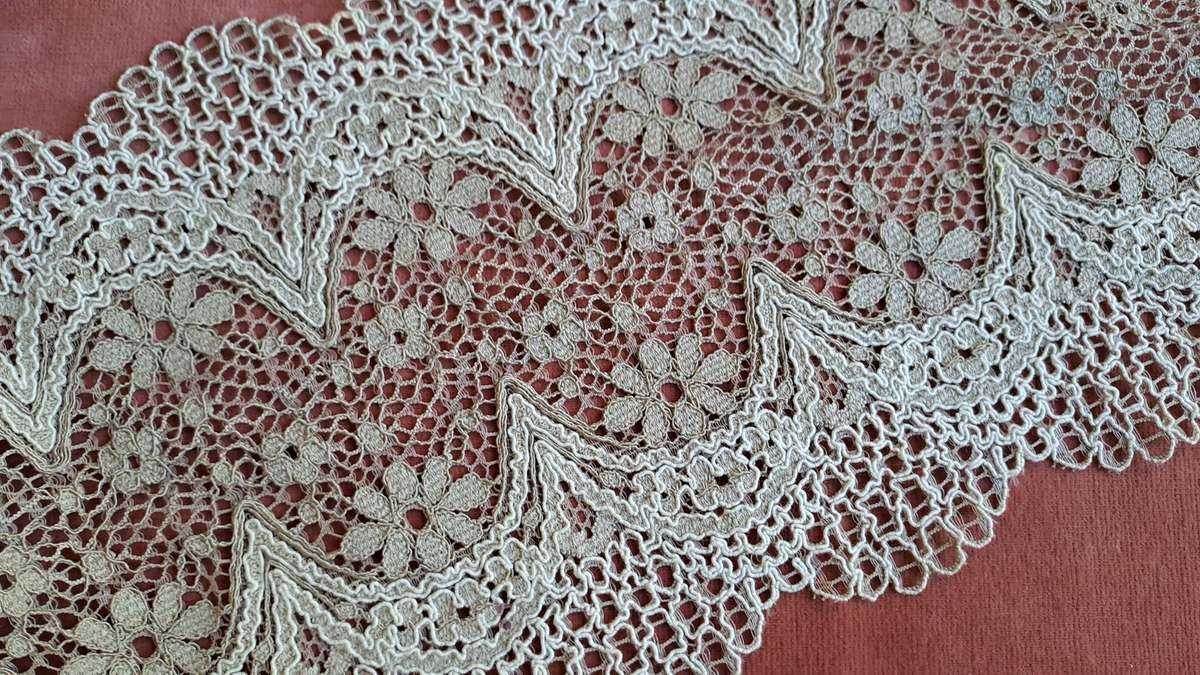 Piece of wide black lace trim  -  130 x 13 cm