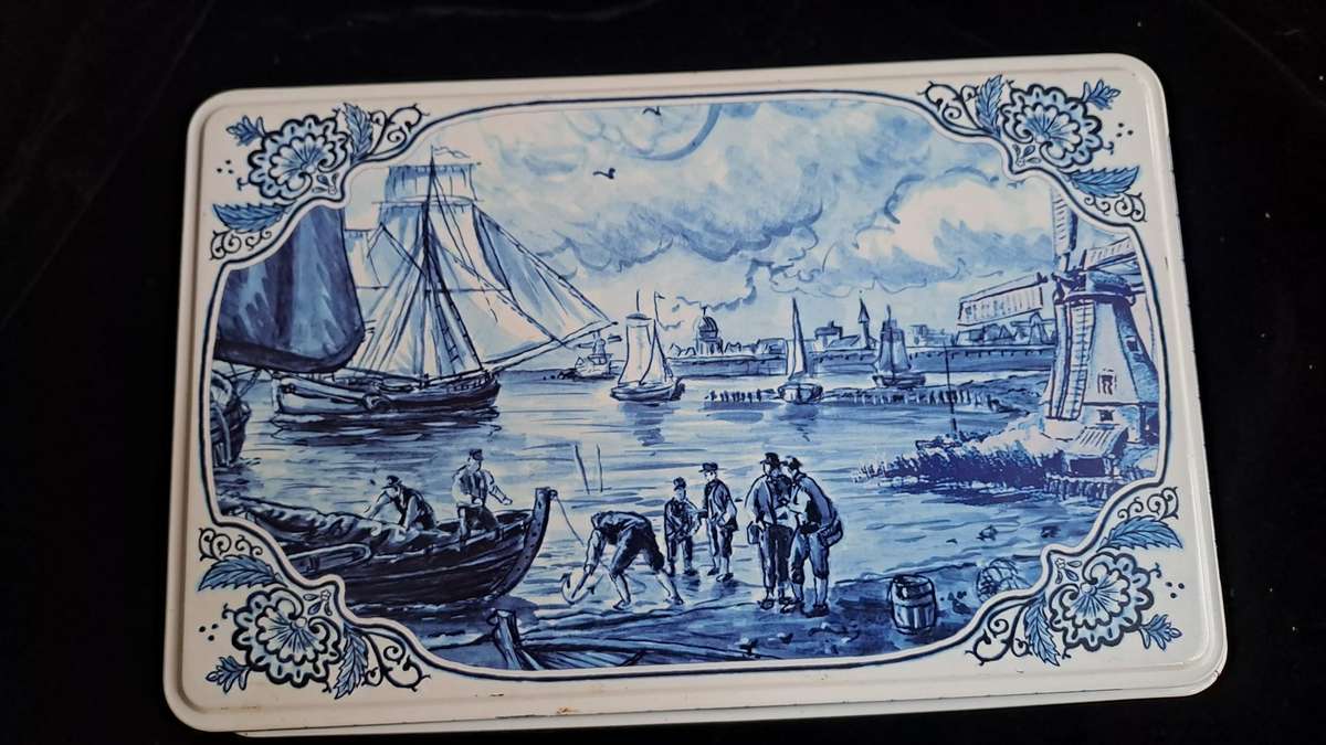 Blue and white tin - 22cm length x 14w x 6cm high - good condition