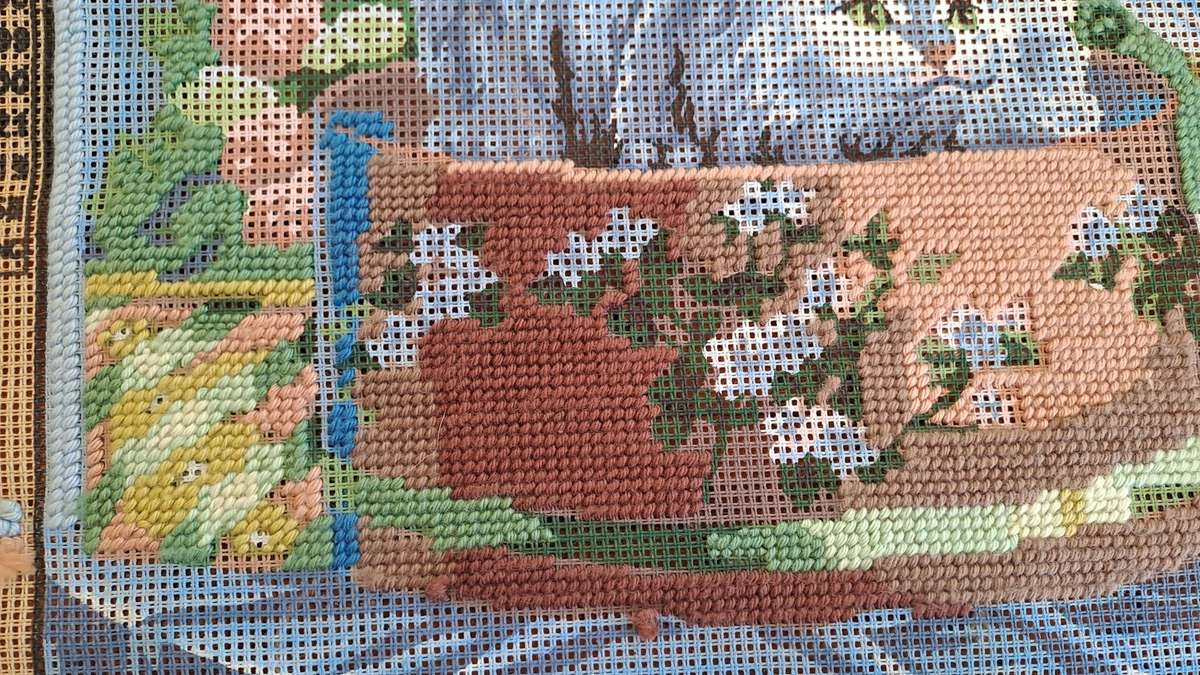 Tapestry canvas and a few yarns - partially completed- 30 x 40cm