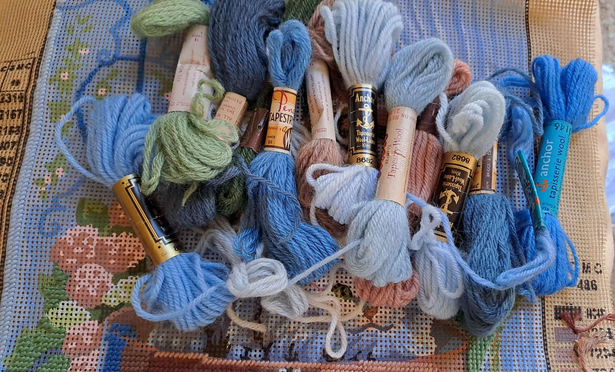 Tapestry canvas and a few yarns - partially completed- 30 x 40cm