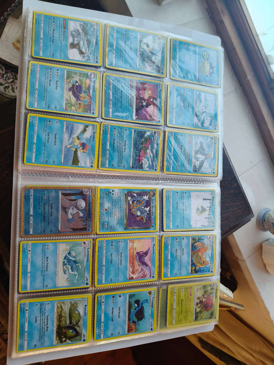 Lot of ±700 Pokémon Cards + 2 Pokémon Tins + Folder