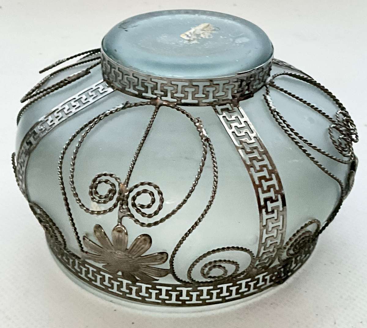 Very pretty frosted glass bowl with ornamental wirework frame