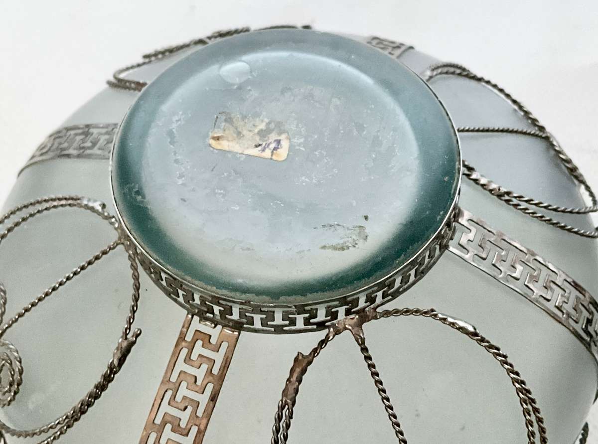 Very pretty frosted glass bowl with ornamental wirework frame