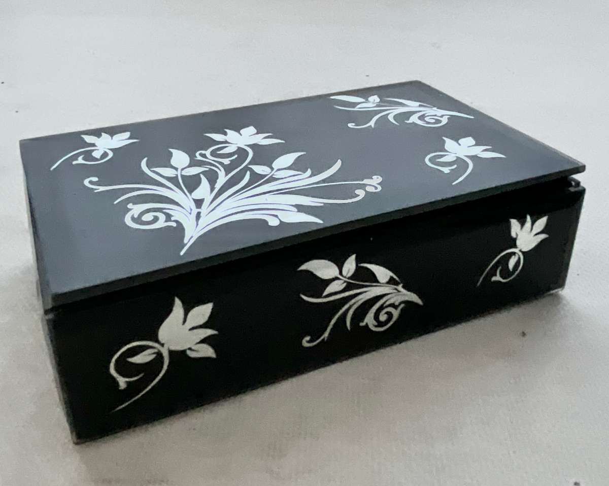Gorgeous little black box with mirrored floral ornaments, handy for jewellery or keeping small items