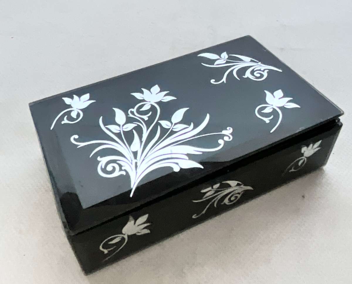 Gorgeous little black box with mirrored floral ornaments, handy for jewellery or keeping small items