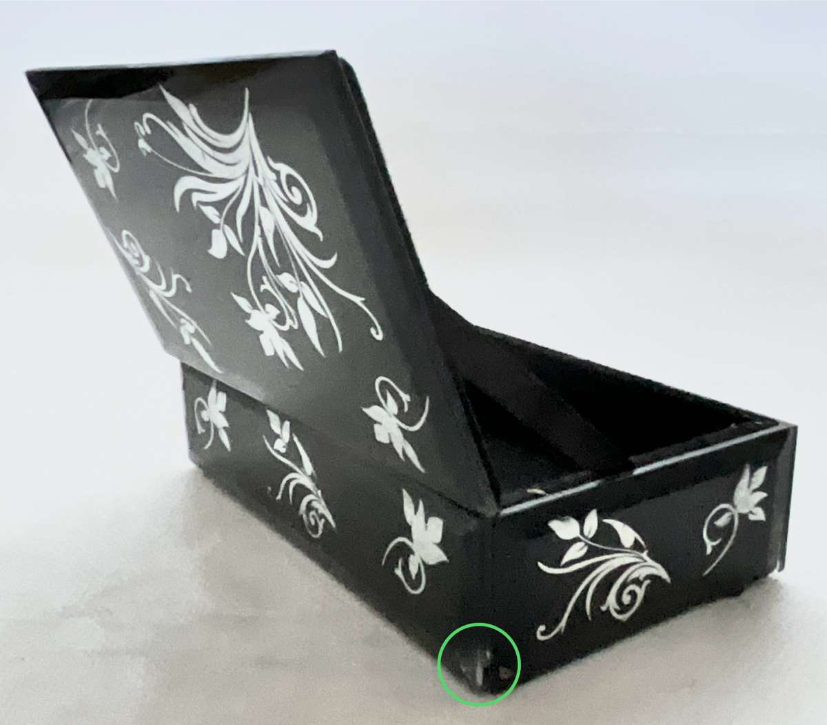 Gorgeous little black box with mirrored floral ornaments, handy for jewellery or keeping small items