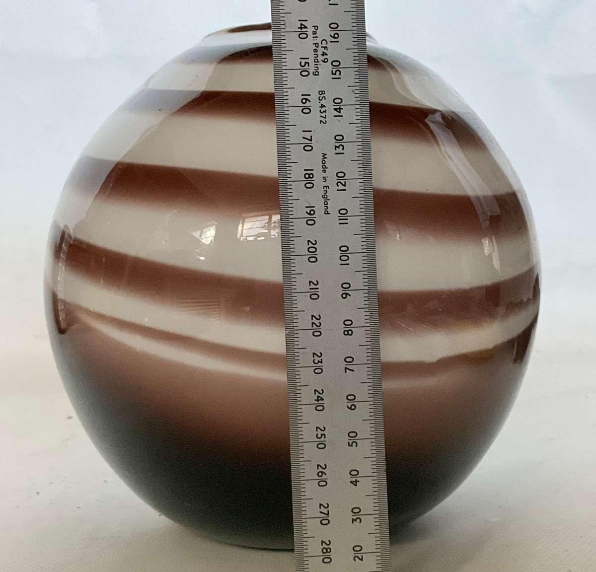 Monochrome swirly striped round glass vase, approx. 16cms tall (please read)