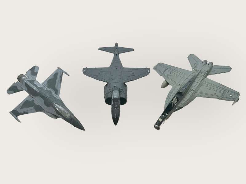 Three metal toy aircraft - please inspect the photos