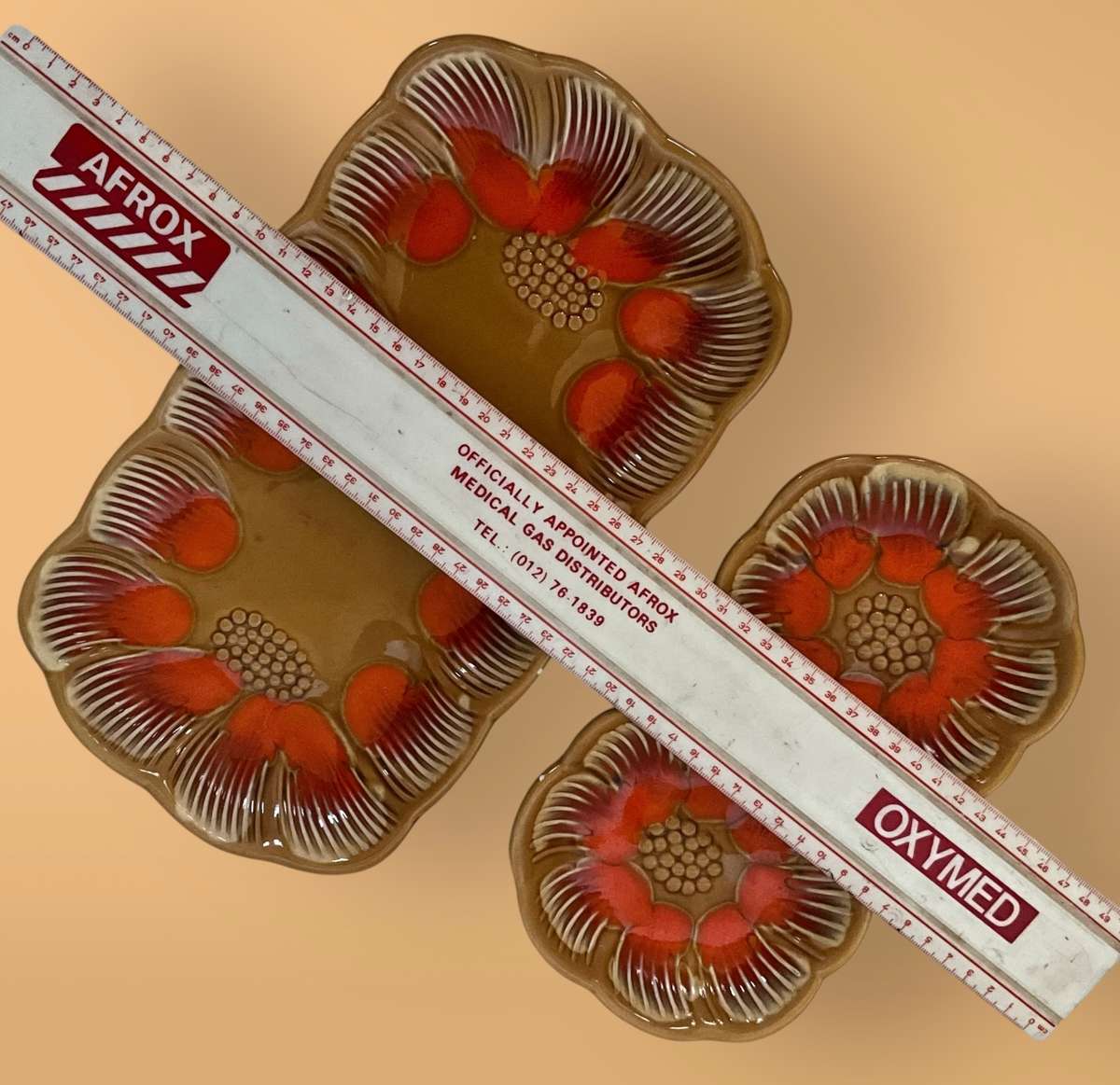 Midcentury retro brown and orange serving set with floral theme