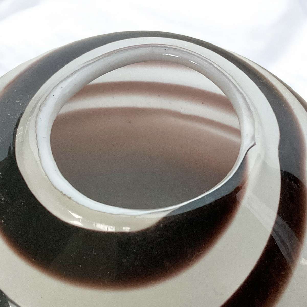 Monochrome swirly striped round glass vase, approx. 16cms tall (please read)