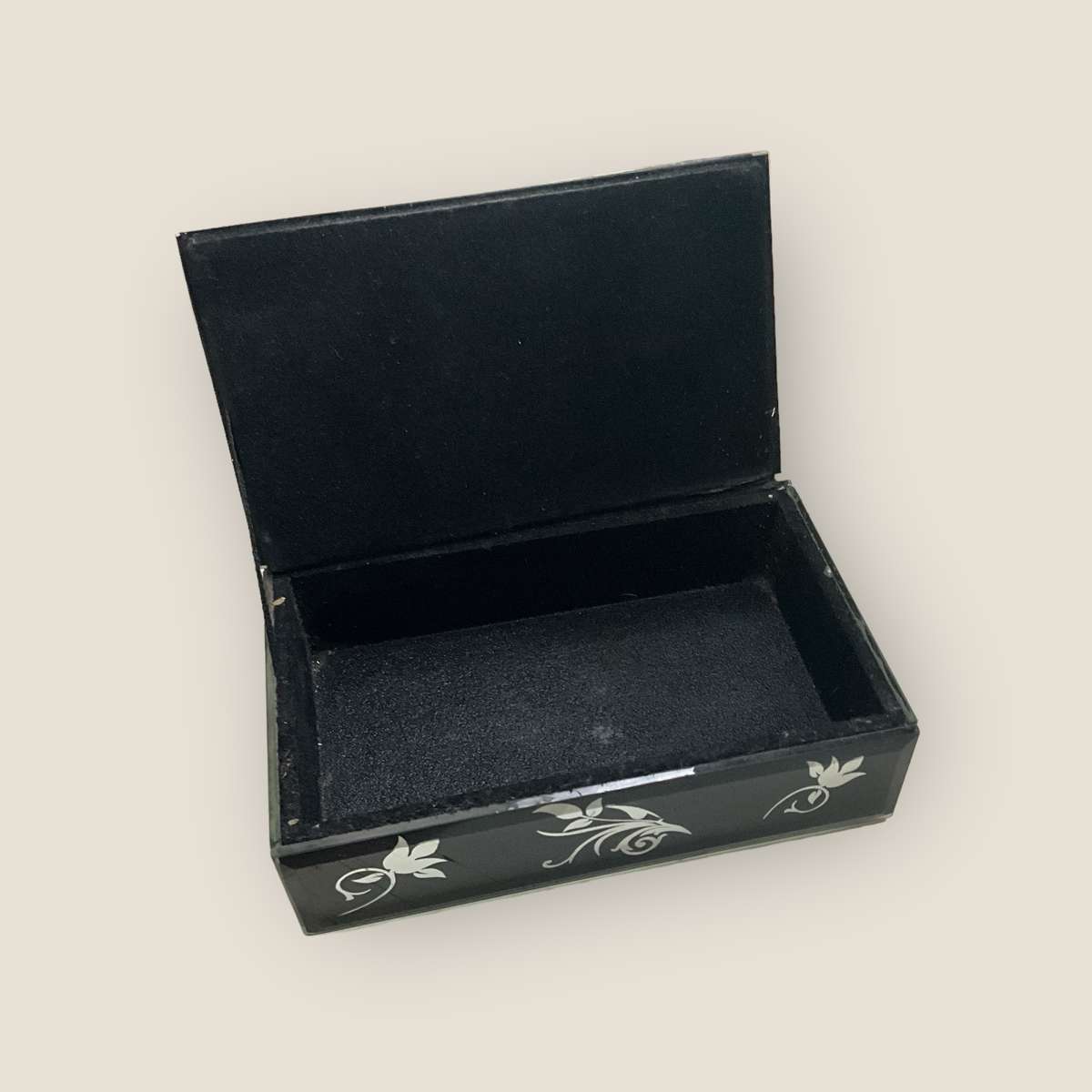 Gorgeous little black box with mirrored floral ornaments, handy for jewellery or keeping small items