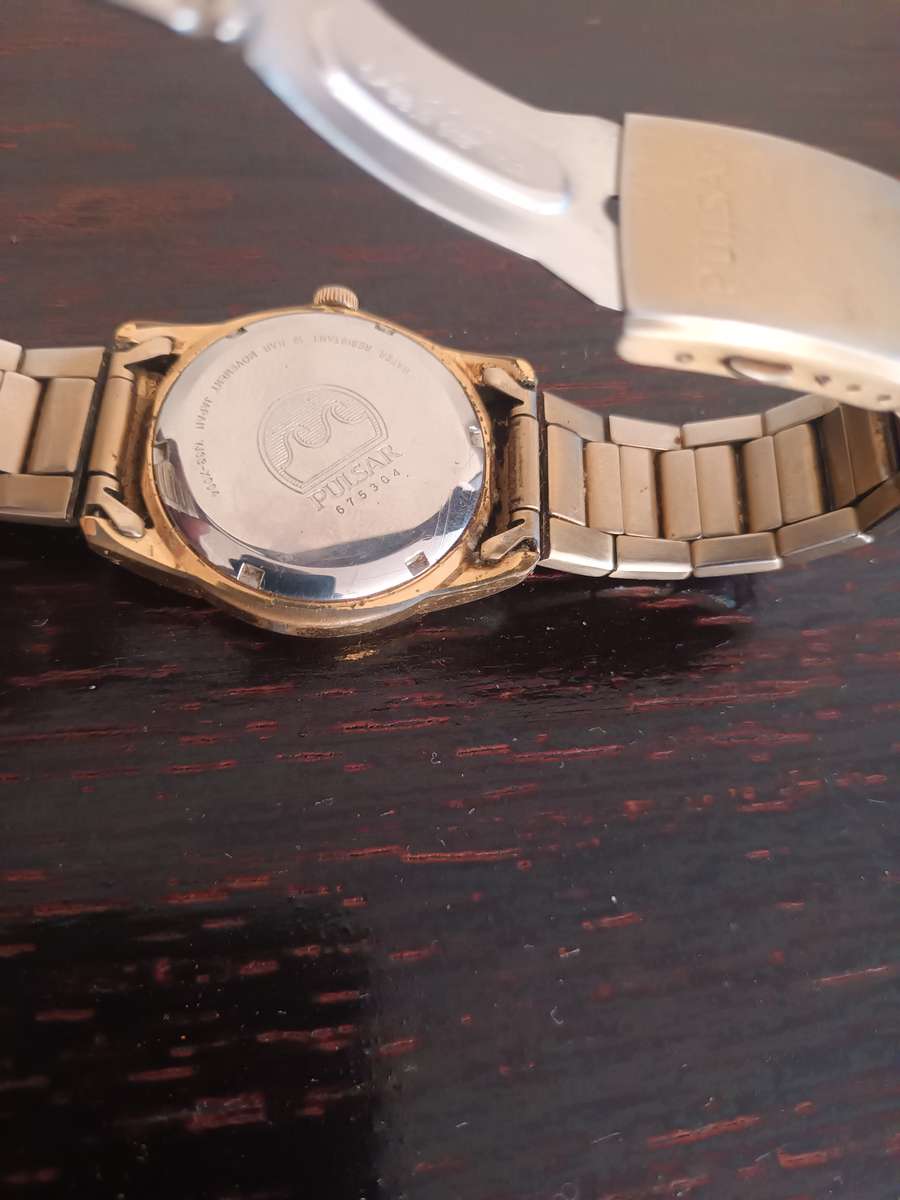 VINTAGE Pulsar Mens VJ33-X004 Classic Day Date Gold Tone Quartz Analog Watch