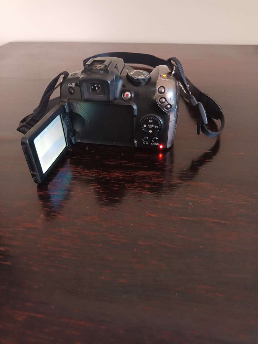 Canon PowerShot SX20 IS 12.1MP CCD Bridge Camera