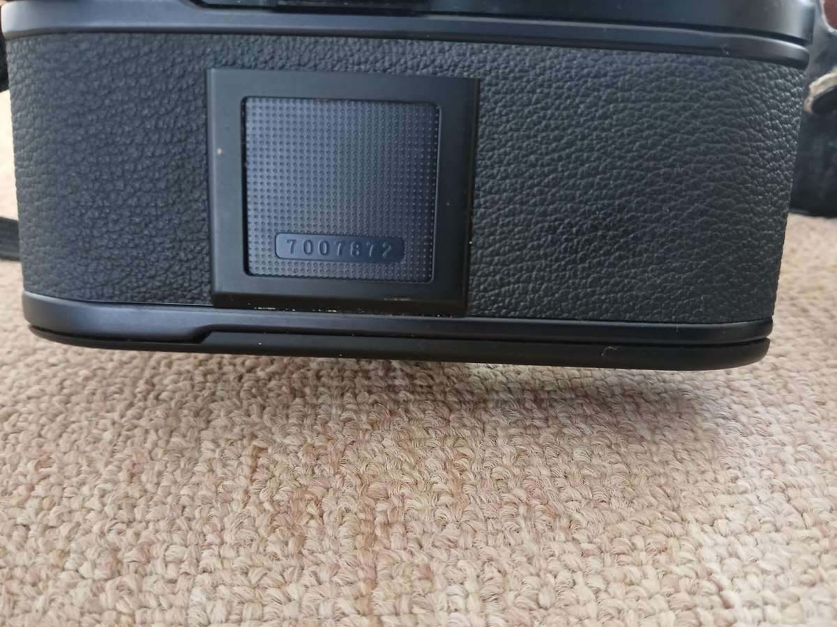 Nikon EM SLR 35mm Film Camera With 50mm Zoom Lens