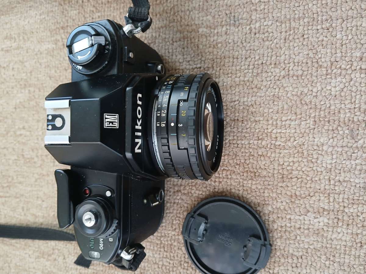 Nikon EM SLR 35mm Film Camera With 50mm Zoom Lens