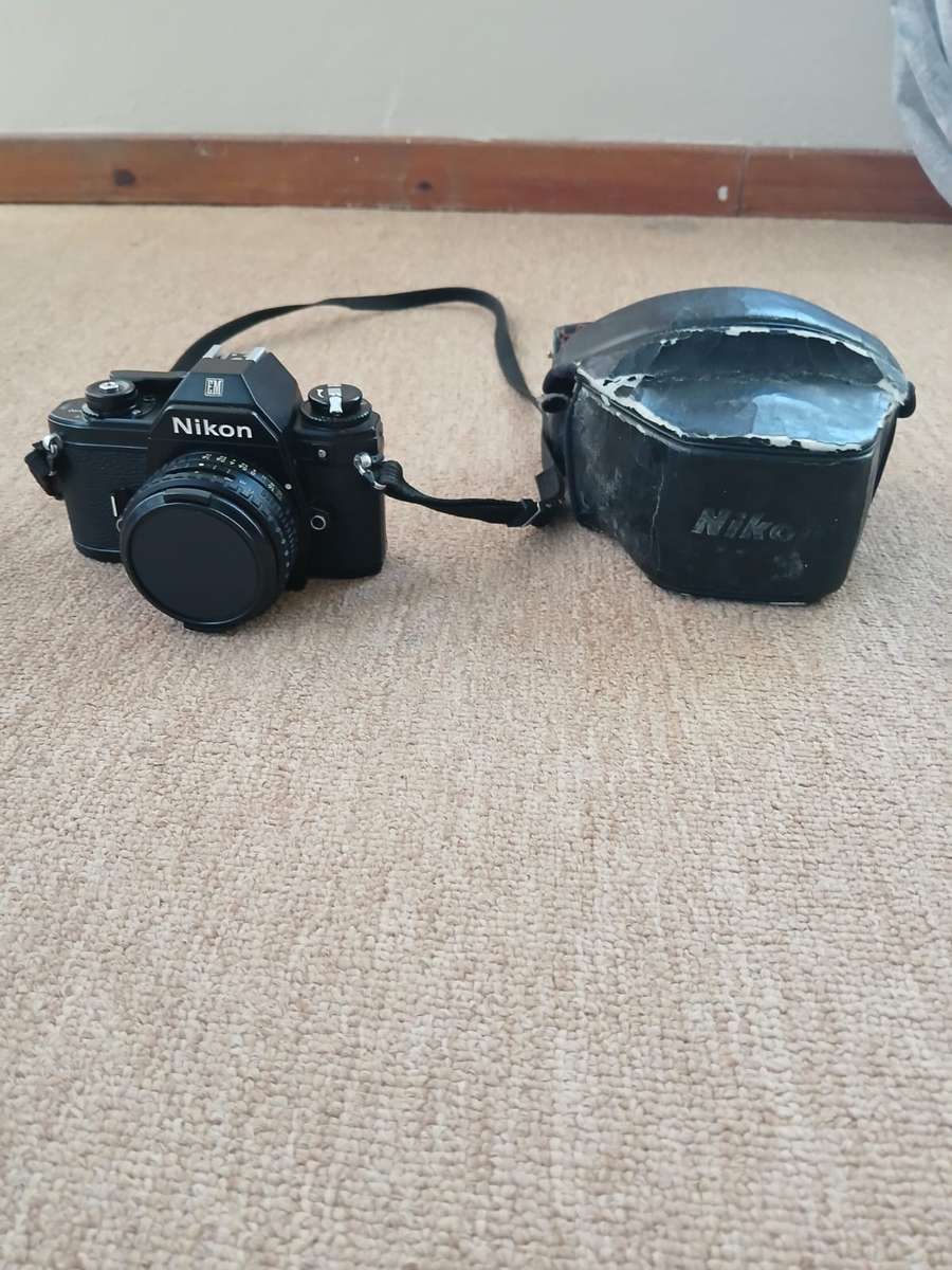 Nikon EM SLR 35mm Film Camera With 50mm Zoom Lens