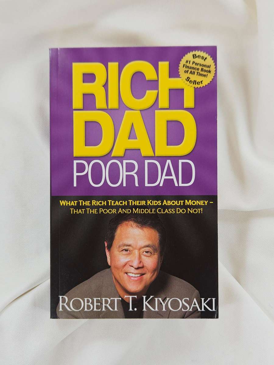 Rich Dad Poor Dad by Robert T. Kiyosaki - Paperback