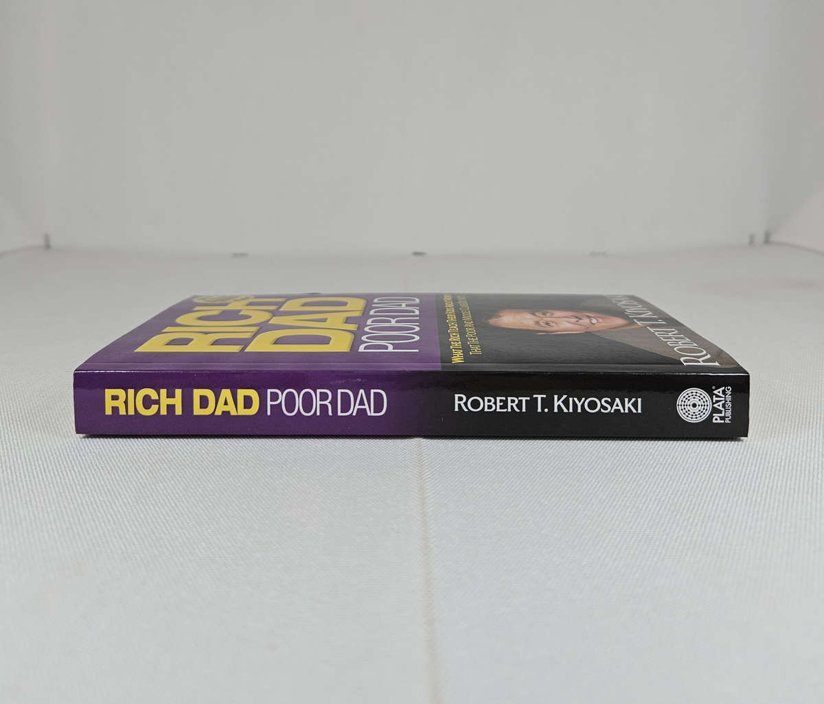 Rich Dad Poor Dad by Robert T. Kiyosaki - Paperback