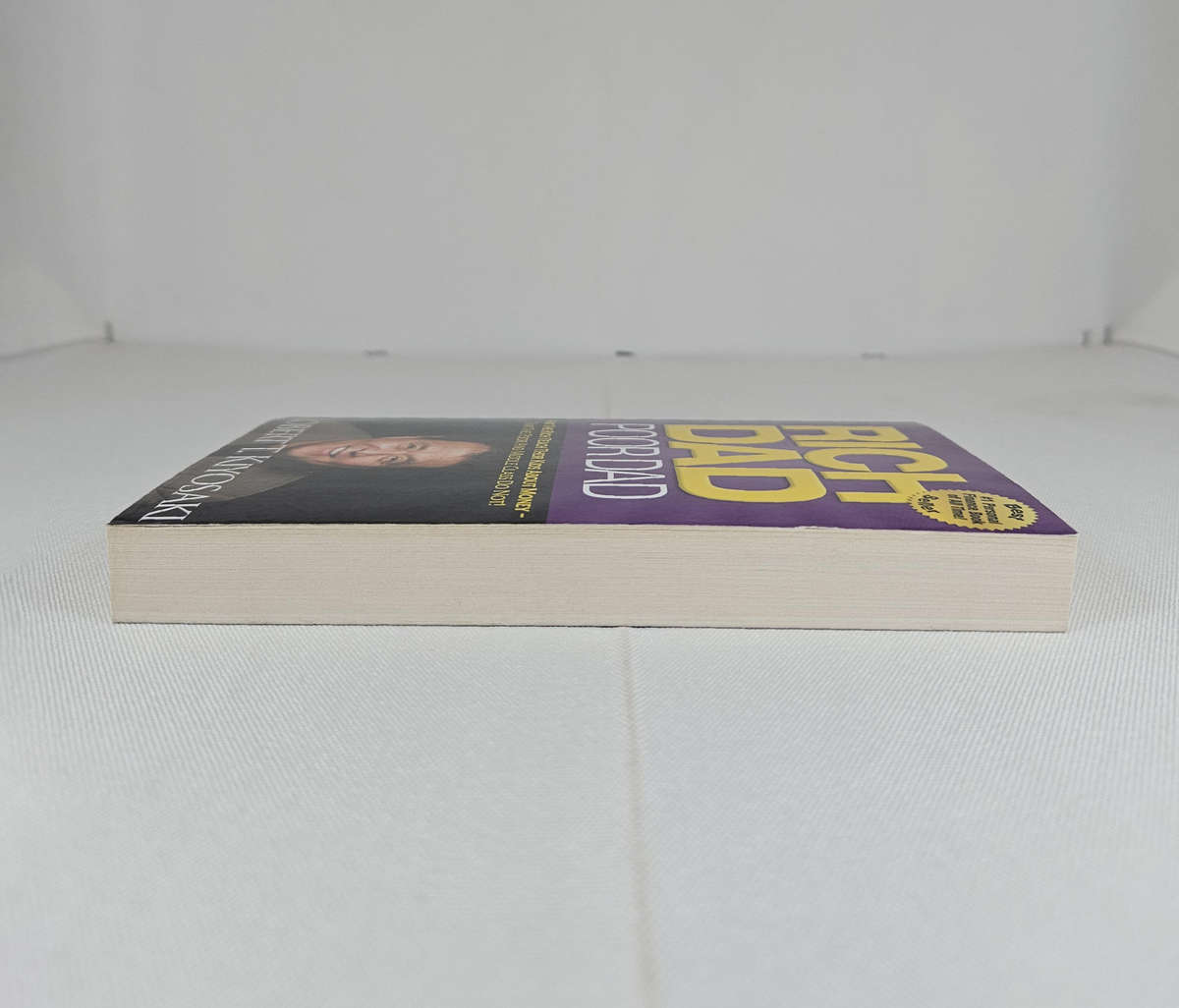 Rich Dad Poor Dad by Robert T. Kiyosaki - Paperback