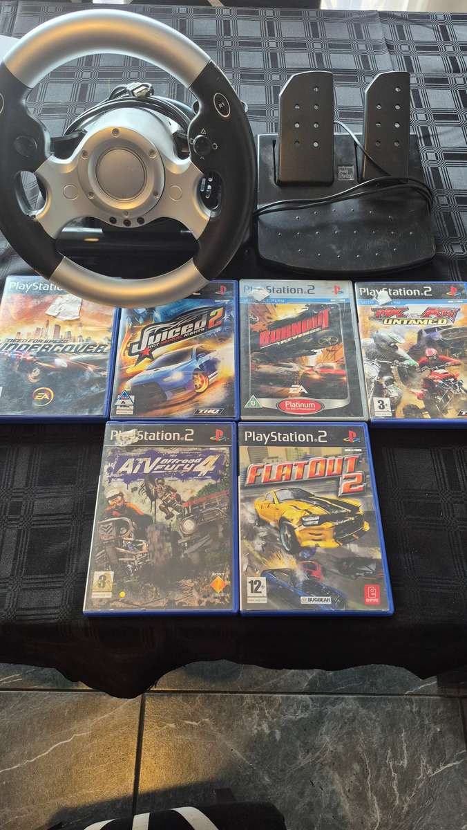 PS2 Racing Combo: Steering wheel with 6 racing games