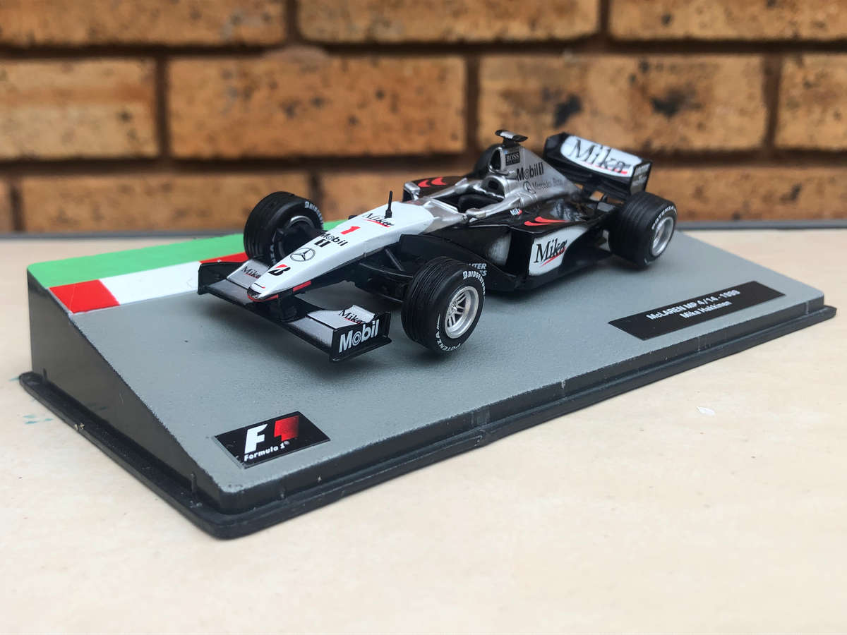 McLaren MP 4/14, 1999 (#1, Mika Hakkinen) model + magazine