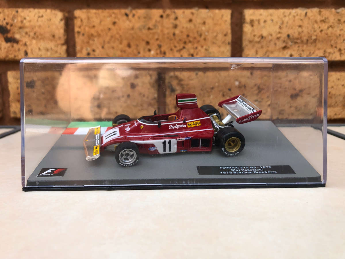 Ferrari 312B3, 1975 (#11, Carlos Regazzoni) + magazine