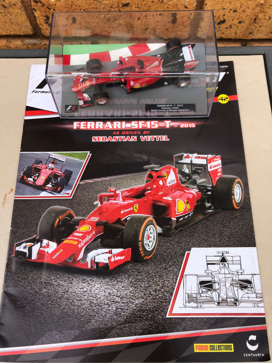Ferrari SF15 - T, 2015 Malaysian GP (#5, Sebastian Vettel) + magazine
