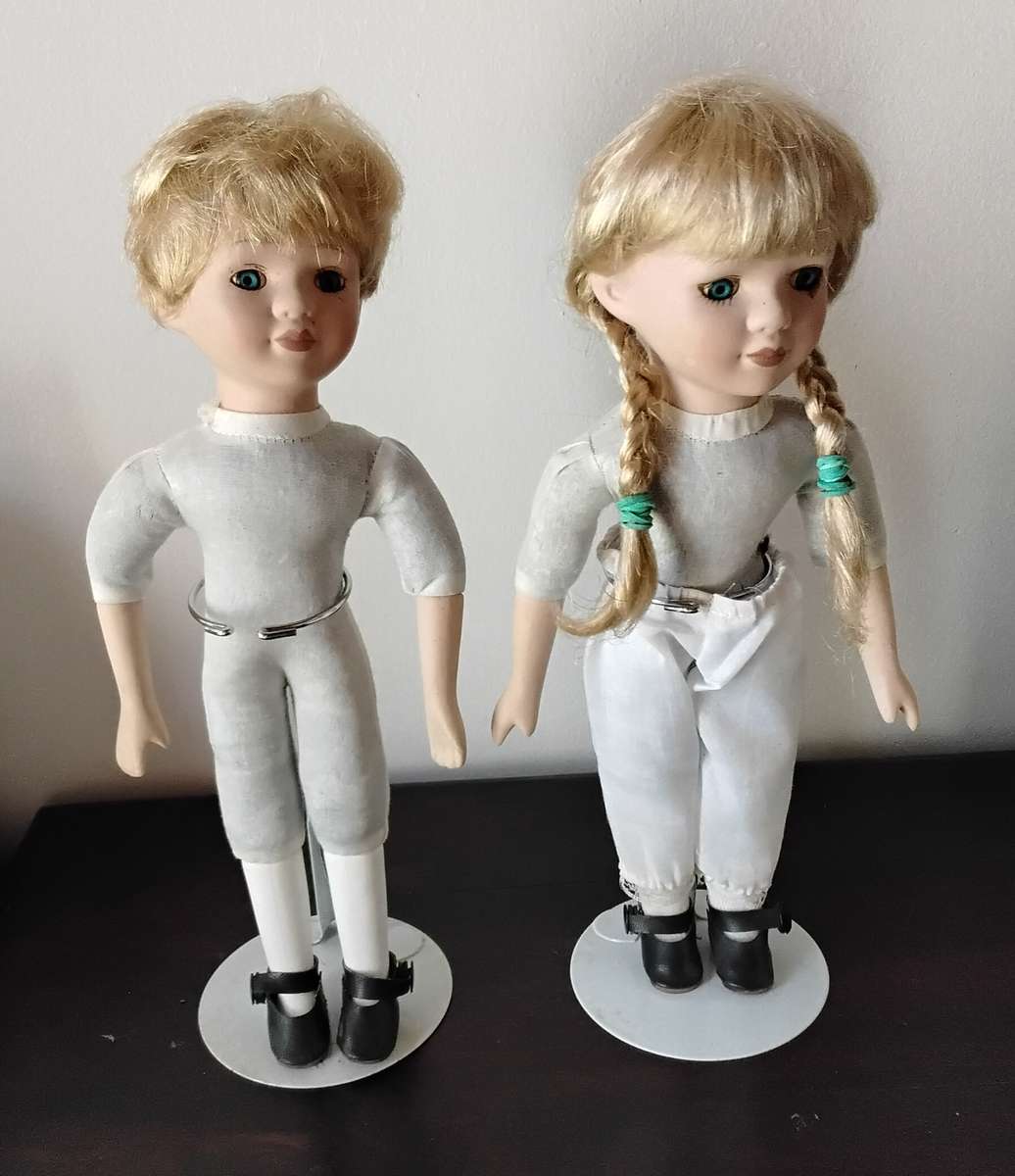 Pair of Vintage Porcelain Dolls on Stands