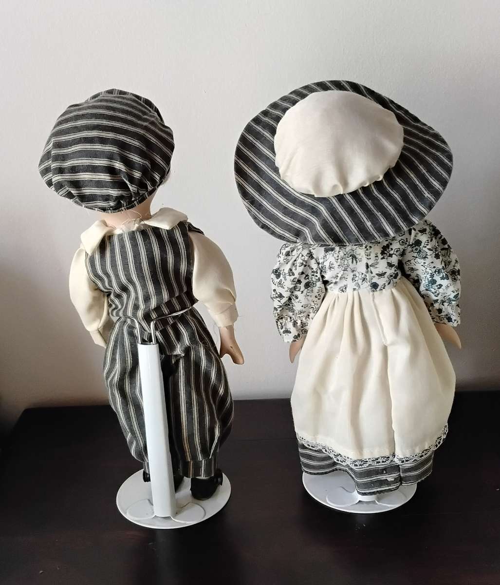 Pair of Vintage Porcelain Dolls on Stands